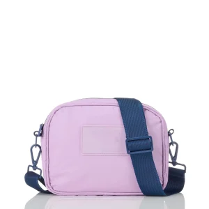 A light purple Tyvek sling bag with adjustable strap, designed for women who love beachwear. The bag's vibrant color and durable material make it a great choice for beach outings and casual use