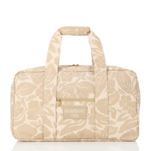 A stylish tyvek travel bag with a full floral print, designed for portability and waterproof functionality. Ideal for beach trips, this bag offers ample storage space and a trendy look