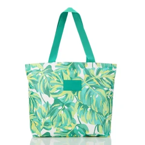 Colorful Tyvek shoulder bag with tropical flower motifs, water-resistant material and comfortable handles ideal for summer travel and beach days